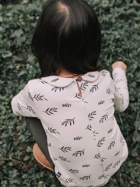 Girls' Cream Long-Sleeve Top with Black Leaf Print